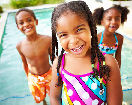 summer camp kids by the pool